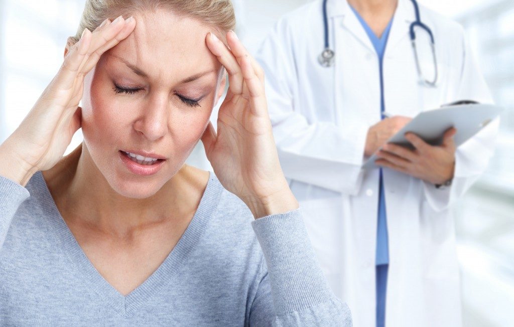 woman having a bad headache