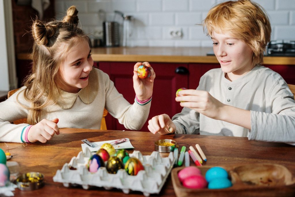 kids playing with easter eggs