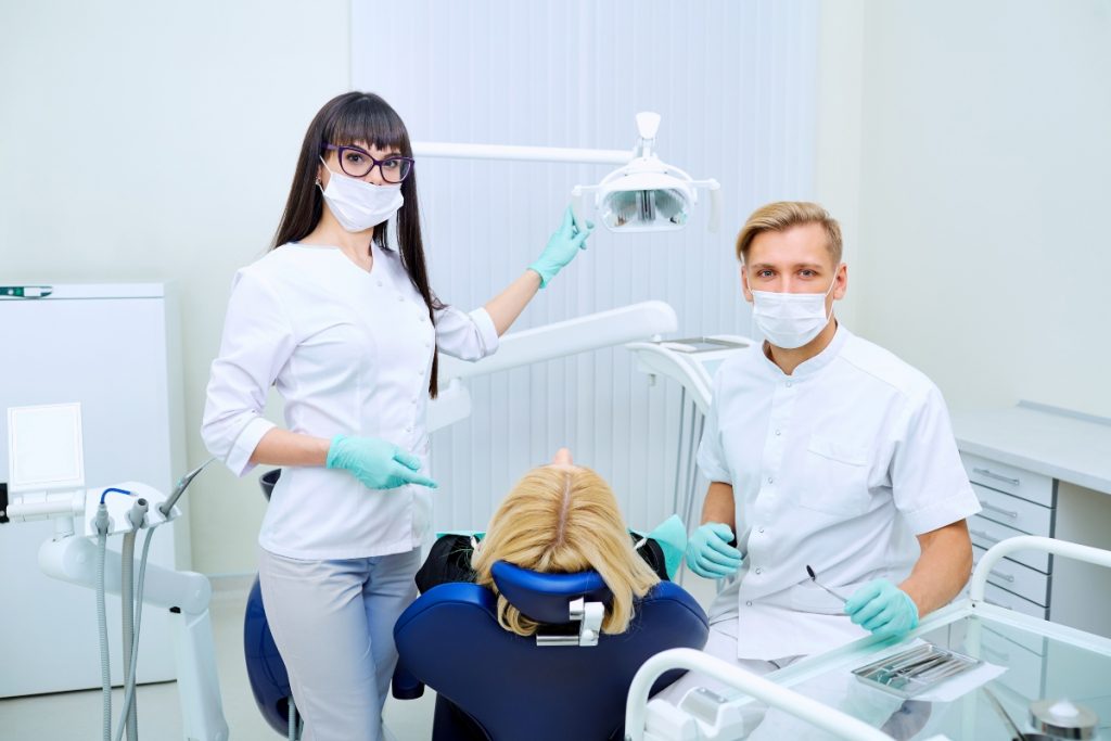 dentists with a patient