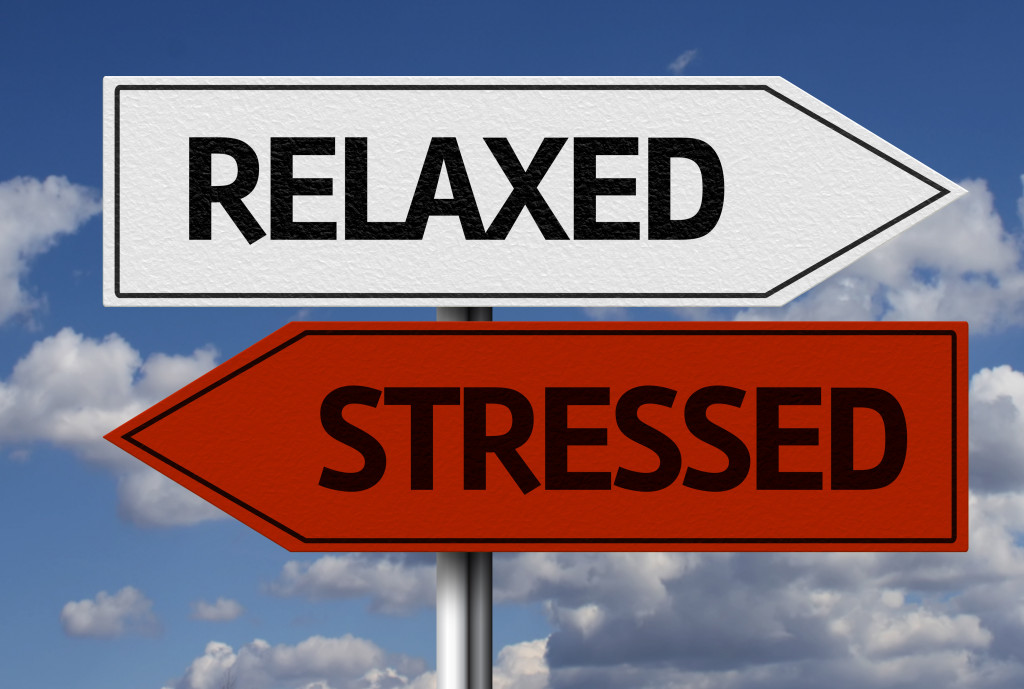 A signboard indicating the words "relaxed" and "stressed"